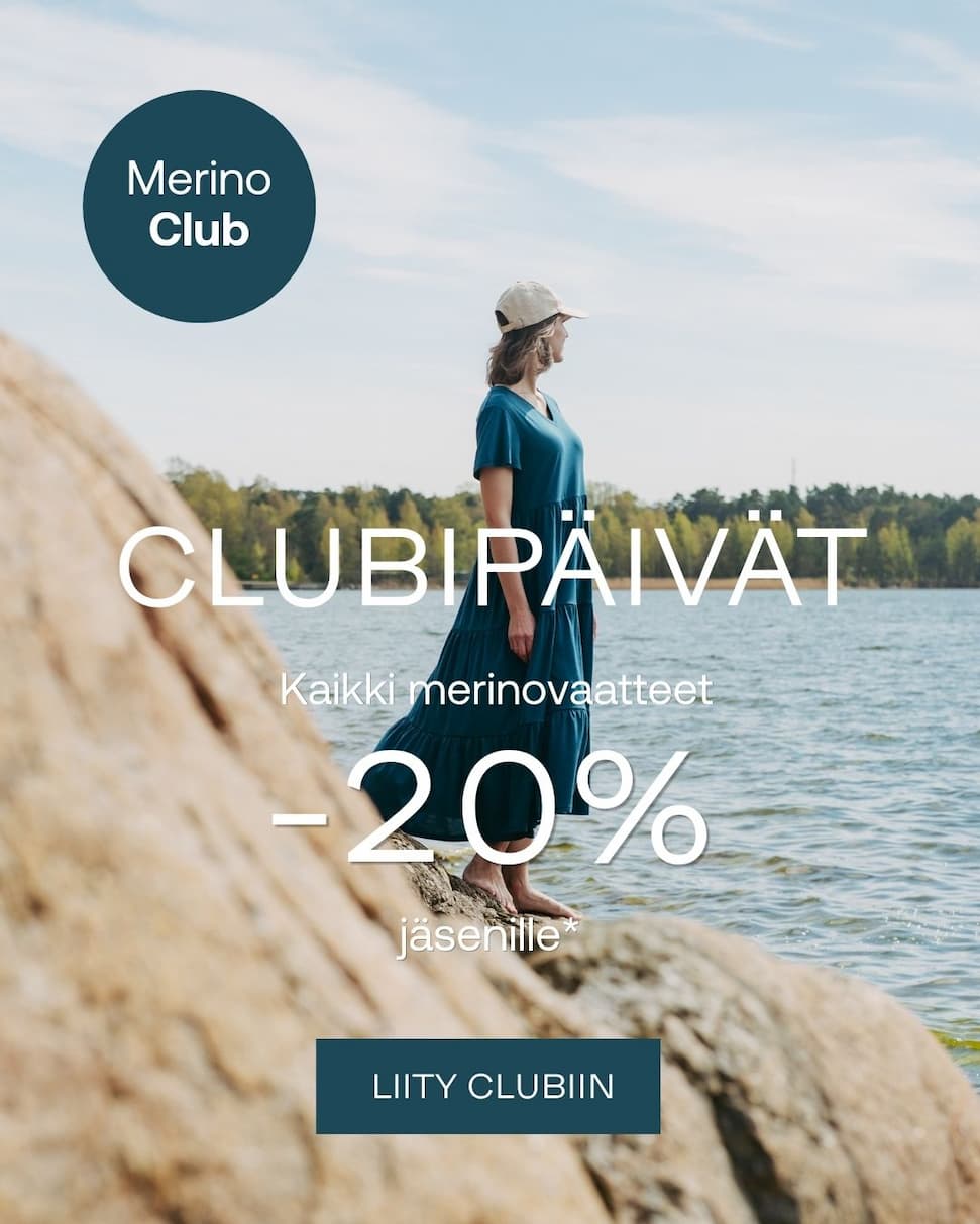 Clubipäivät. Nainen seisoo kalliolla päällä LIly merinomekko.