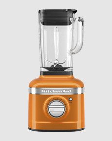 Orangenfarbener Standmixer von KitchenAid mit transparentem Behälter.