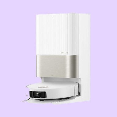 Weißer Saugroboter in Ladestation