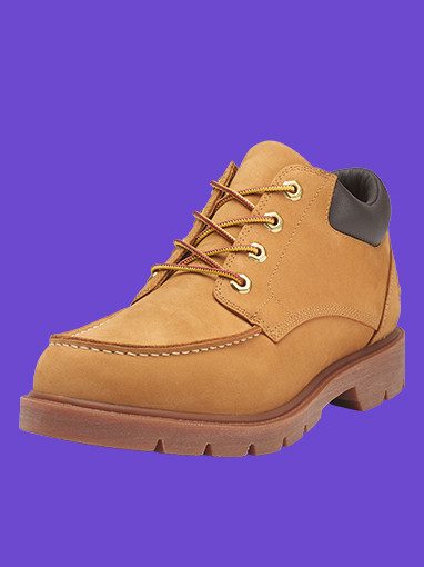 Braune Schnürstiefelette mit gelben Schnürsenkeln.