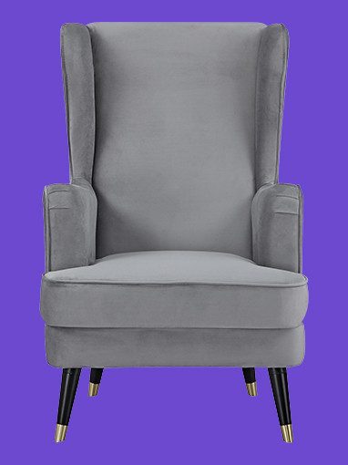 Grauer Ohrensessel mit schwarzen und goldenen Beinen.