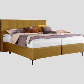 Boxspringbett mit gestepptem Kopfteil, inklusive Matratze und Topper in curry