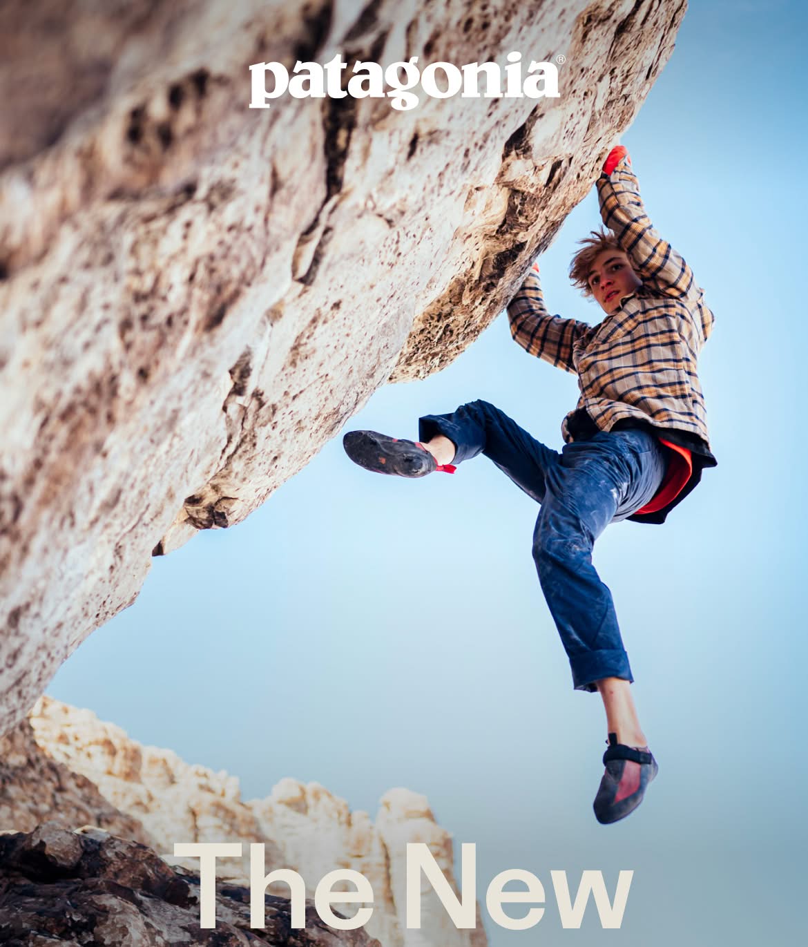  Patagonia. A person climbs a rock overhang.