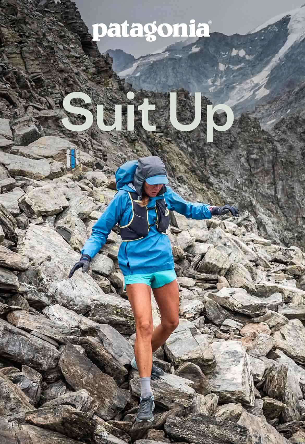 Ppatagonia. A runner descends a steep talus slope.