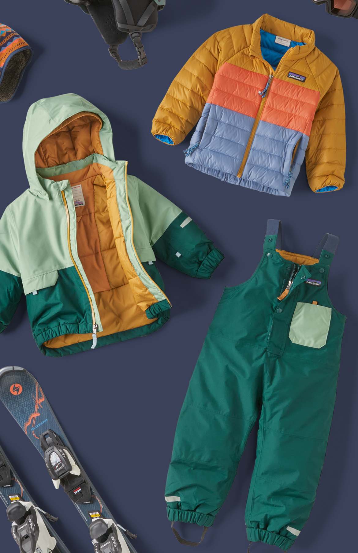 An assortment of kids’ snow clothing and gear.