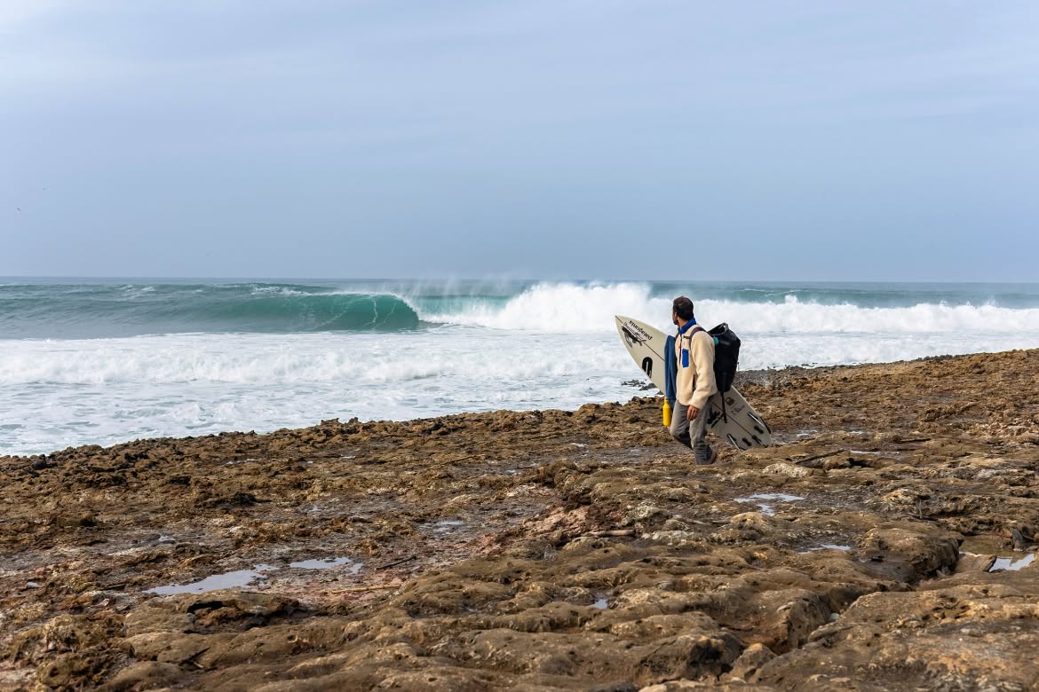 Surfer looking at the waves