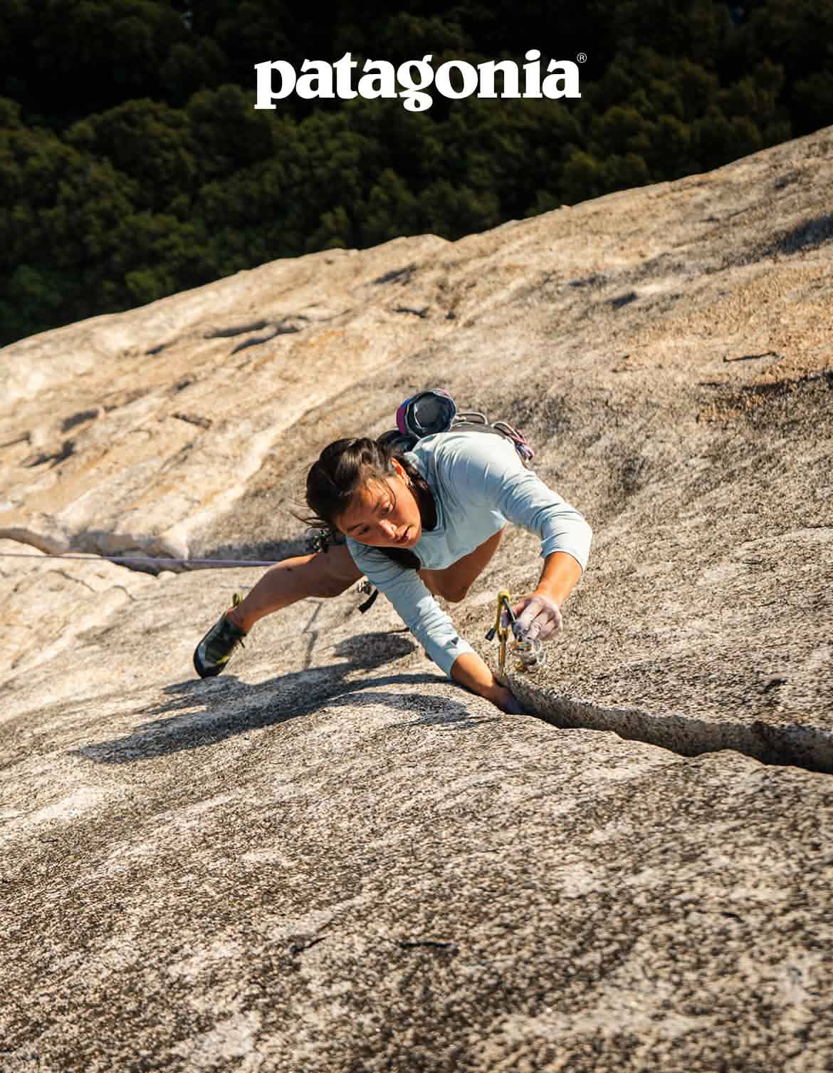 Patagonia. A person climbs a crack on a big wall.