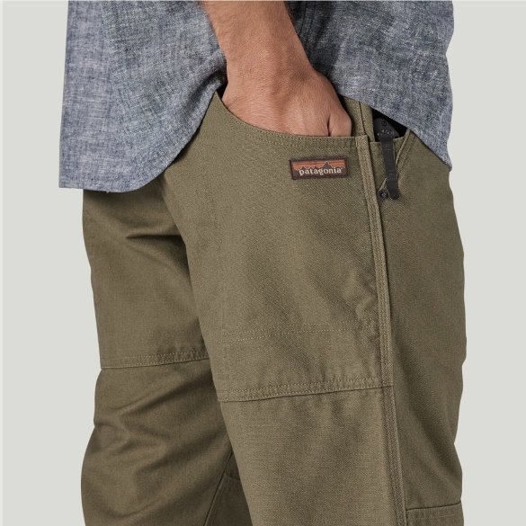 and using their hand to show size and depth of pockets.