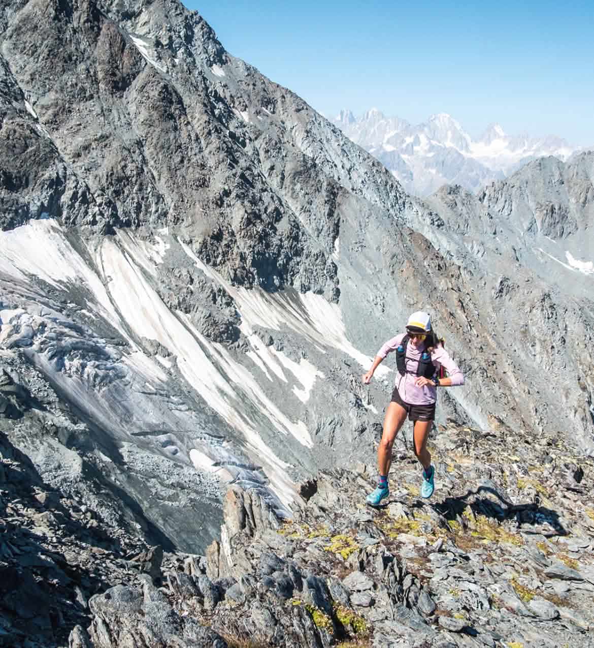Runner in alpine terrain.