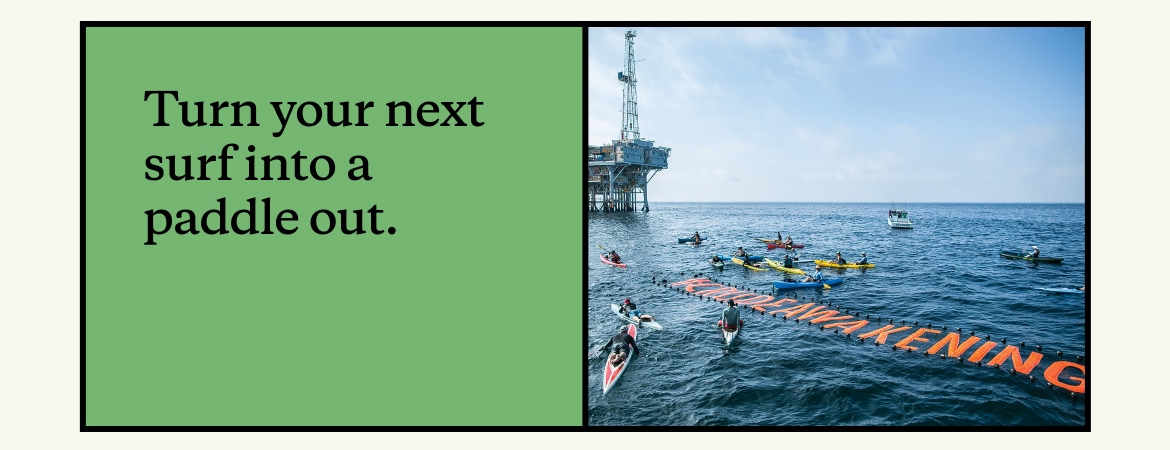 A group of kayakers and paddleboarders float around an offshore oil platform in protest of pollution from oil excavation and transport.