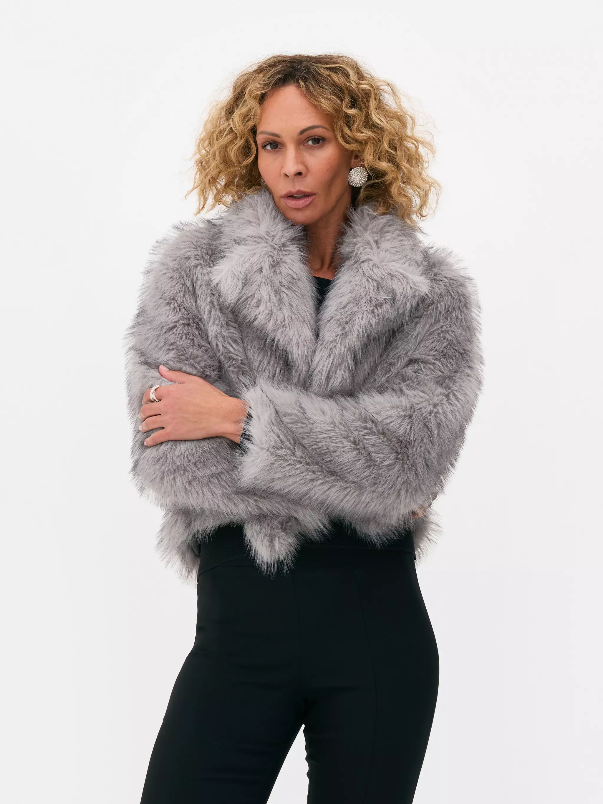 Model wearing Grey Rita Ora Faux Fur Jacket