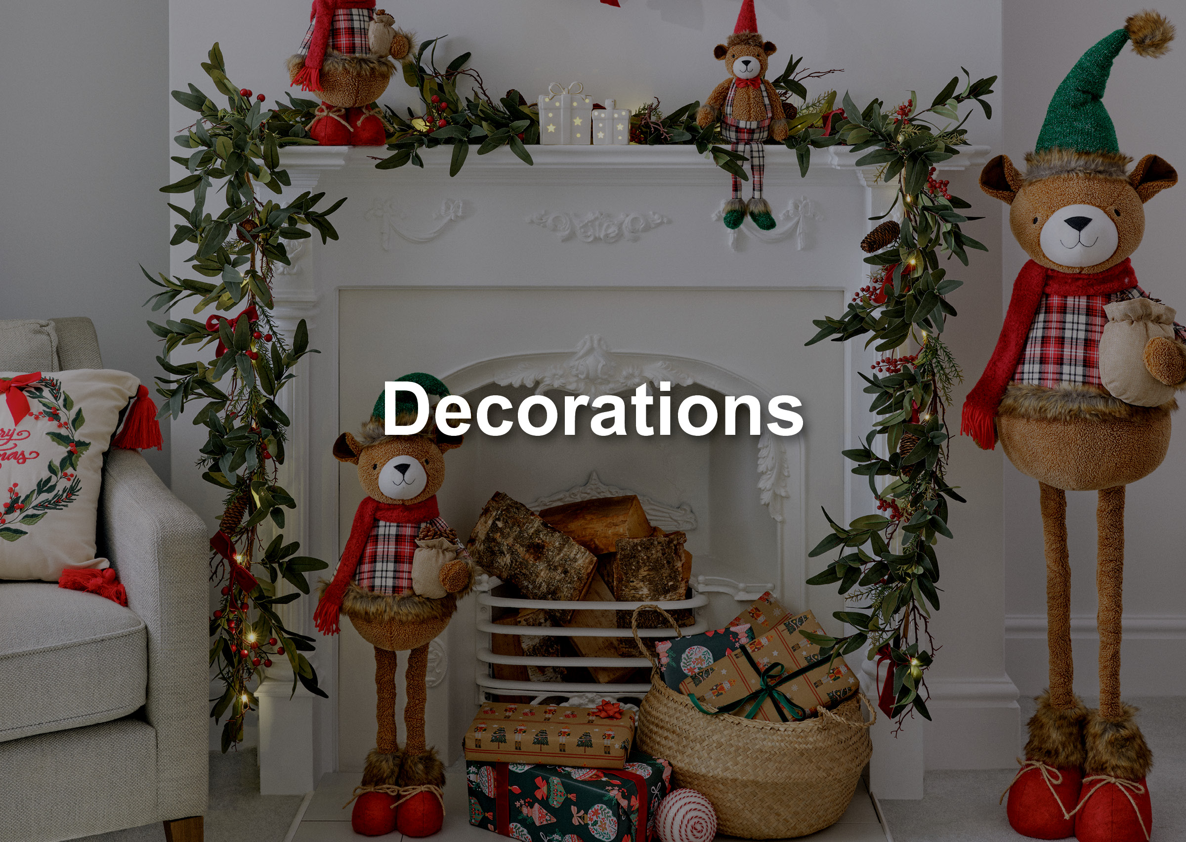 Living room dressed in christmas themed pillows, garland 