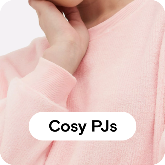 Female wearing pink minky pyjamas