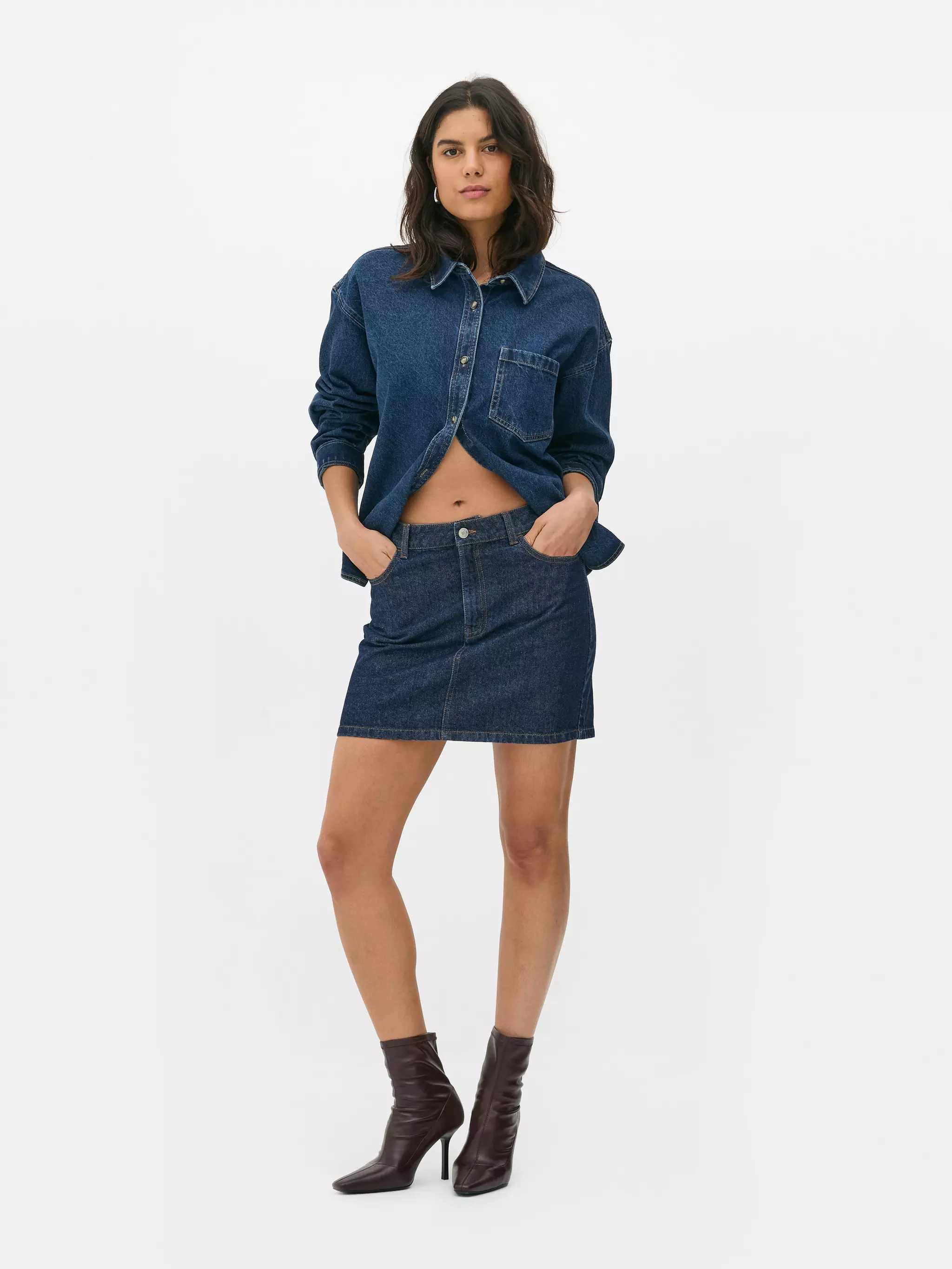 Model wearing Denim Mini Skirt