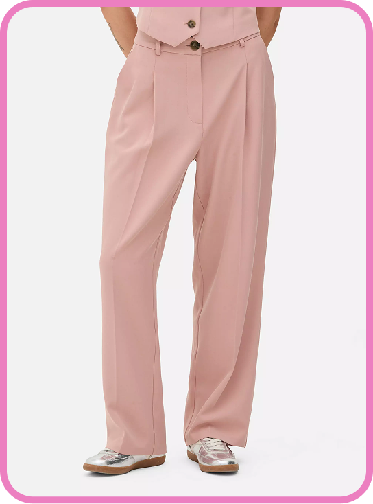 Woman wearing Co-ord Tailored Trousers in pink