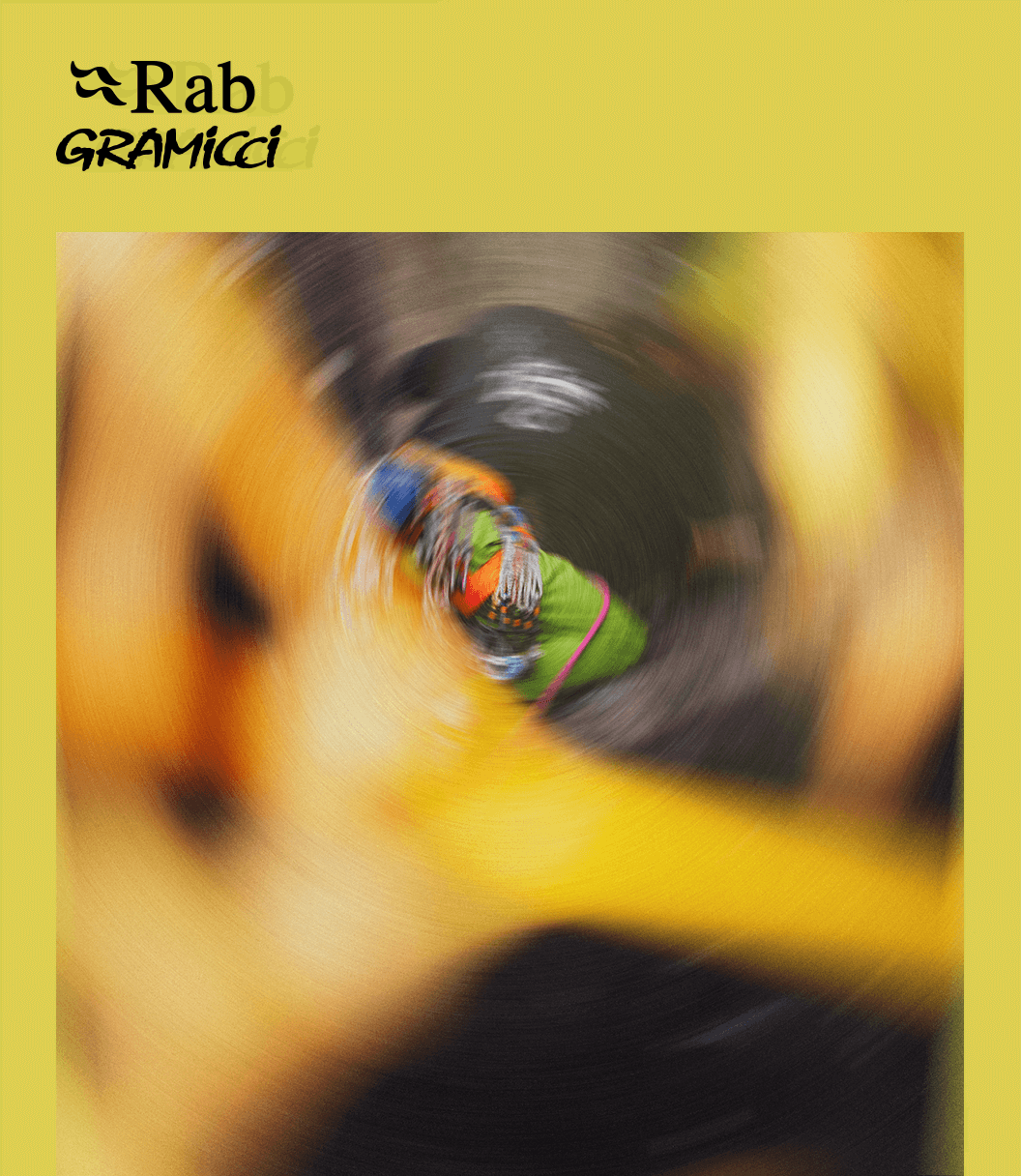 Rab & Gramicci - The image shows a blurred climber with a flash of bright green visible.