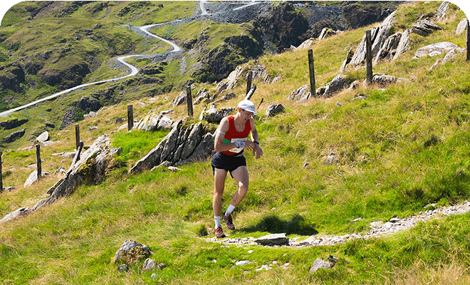Runner running through the hills