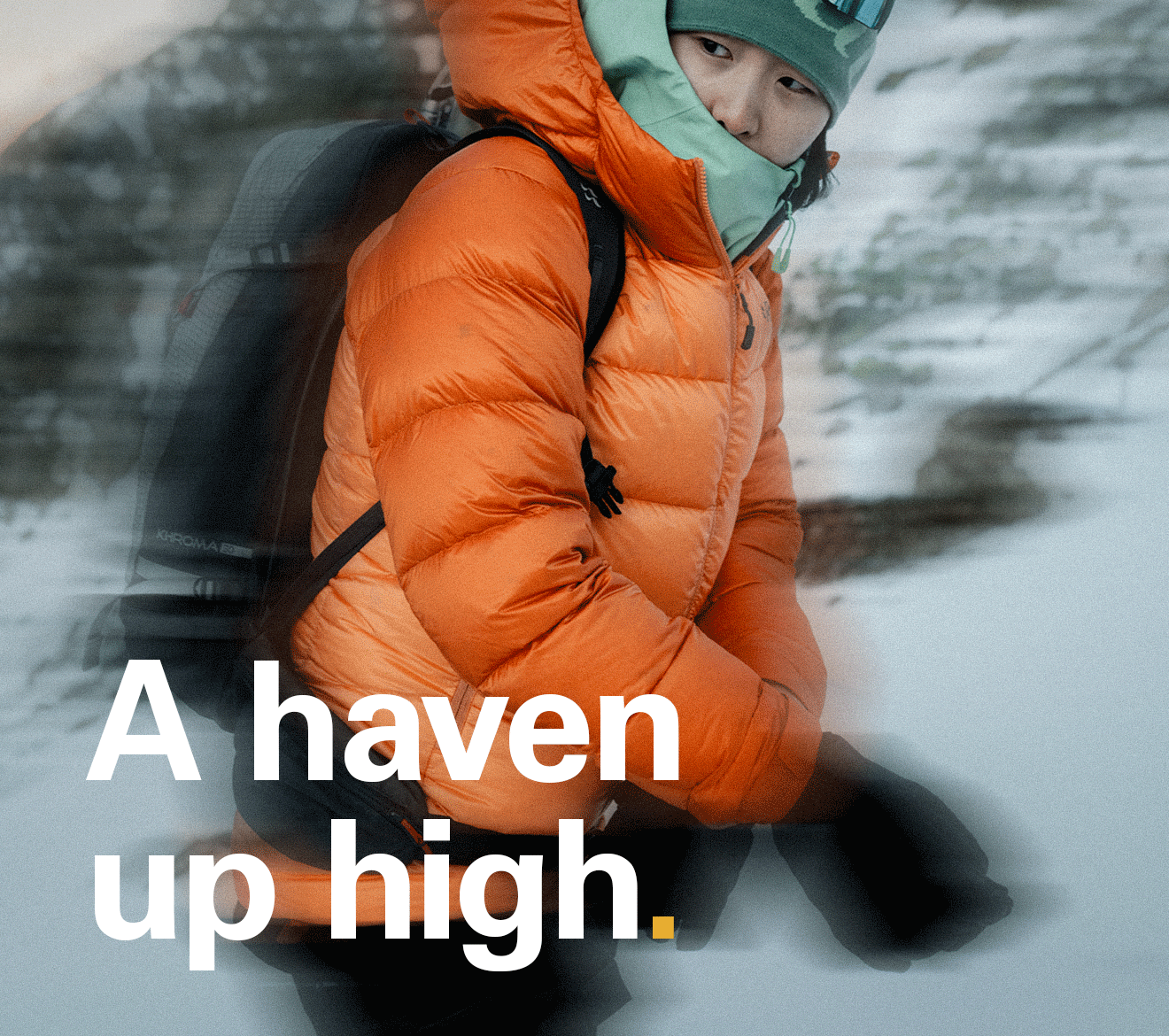 An alpinist wearing a Neutrino Pro Down Jacket in the snowy mountains - A haven up high