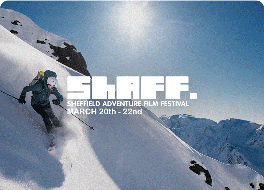 Two hikers heading up hill.