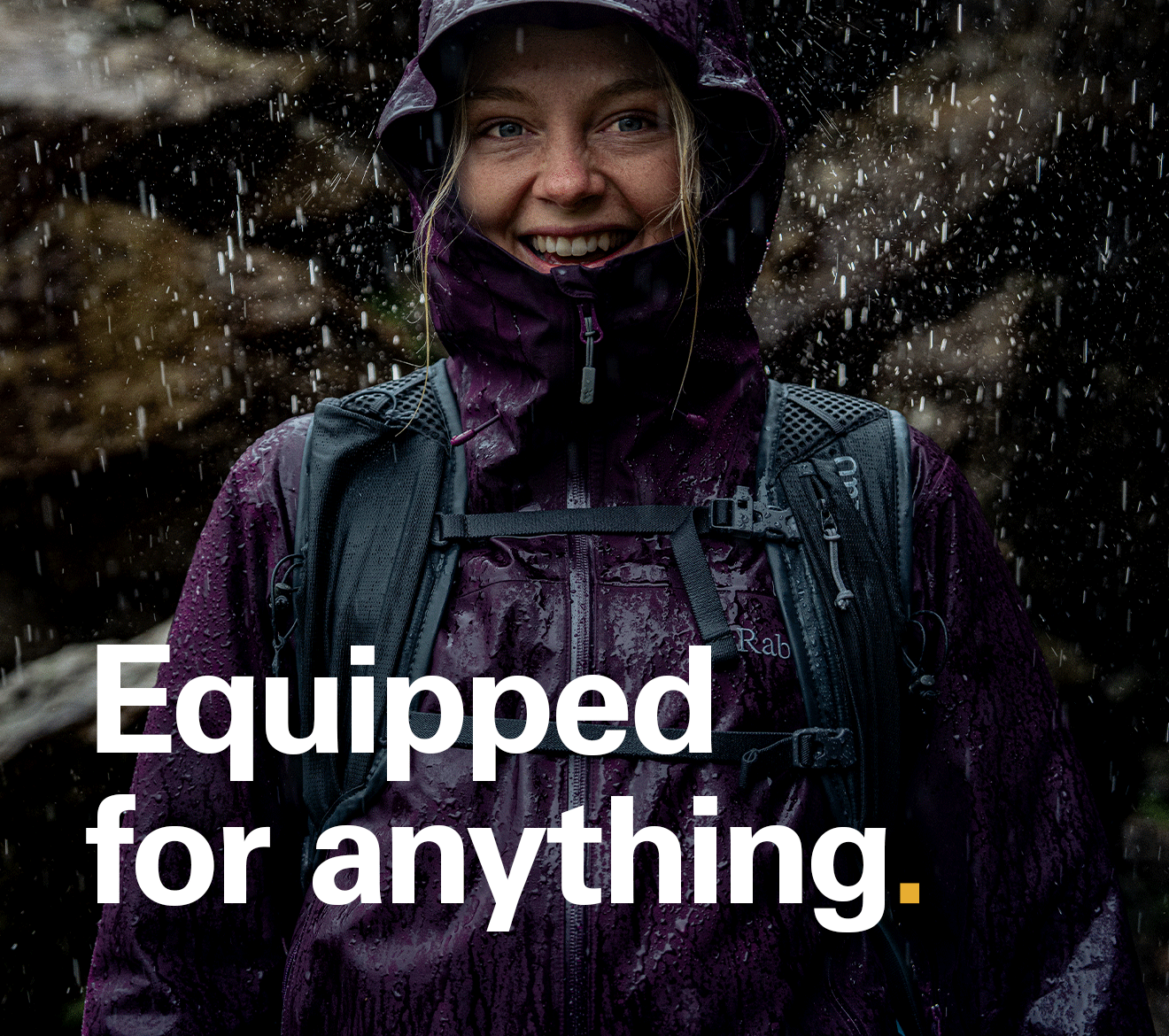 lifestyle imagery of a woman in a Rab waterproof jacket in the rain - Equipped for anything