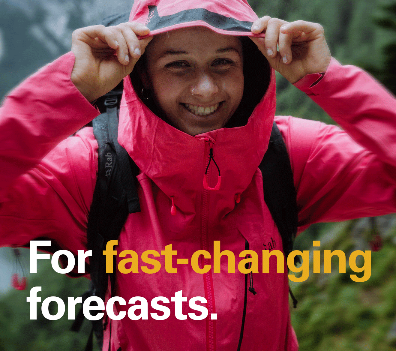 'For fast-changing forecasts' text over the image of a women wearing a Firewall Rab waterproof jacket.