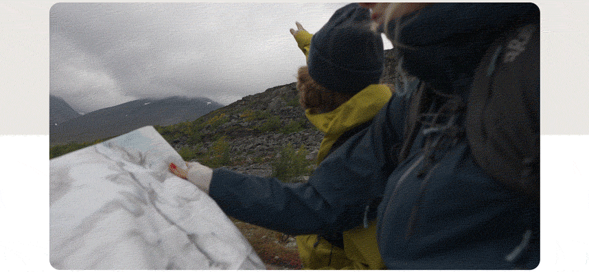 GIF of a group of people walking in the hills in damp misty conditions