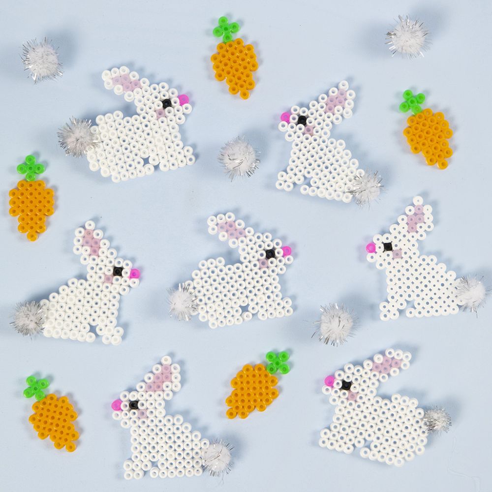 Easter bunnies made from Fuse beads with pompom tails