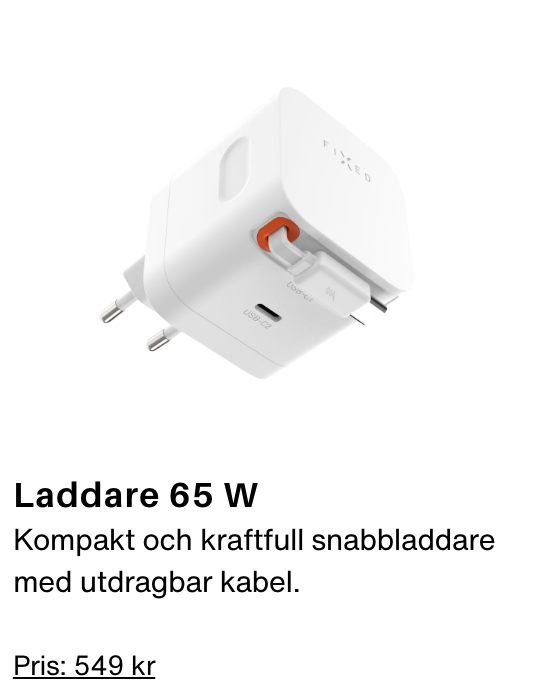 an image of a white wall charger with a red button