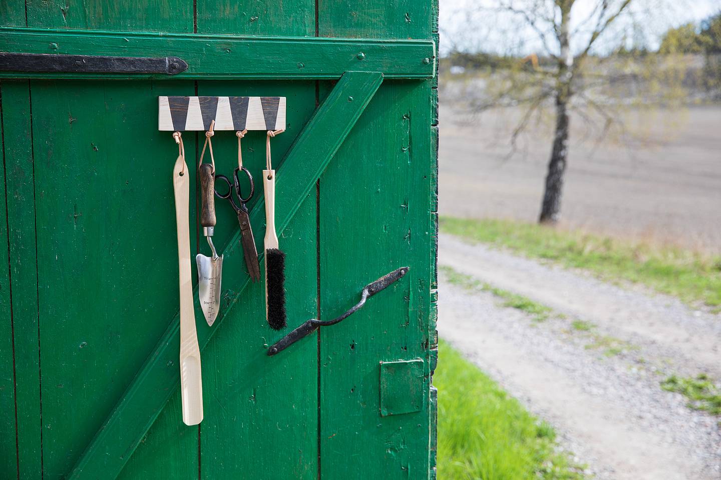 H&auml;ngare f&ouml;r tr&auml;dg&aring;rdsredskap