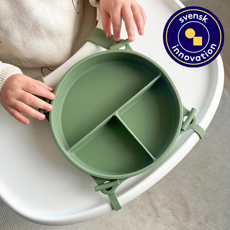 Barntallrik med sugpropp och sp&auml;nnband