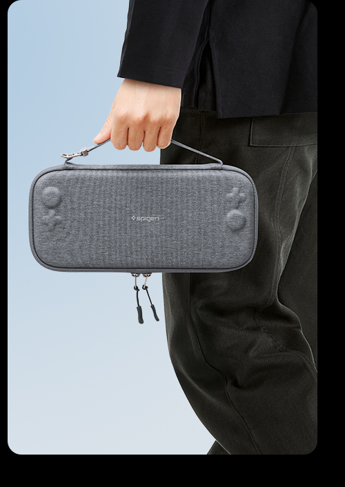 Two-way strap for wristlet or top-handle carry.