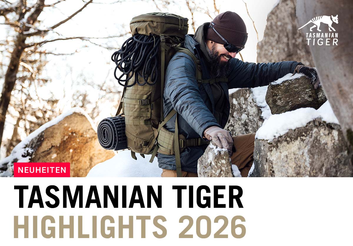 Outdoor-Abenteurer mit großem Tasmanian Tiger Rucksack im winterlichen Gelände – Highlights 2026.