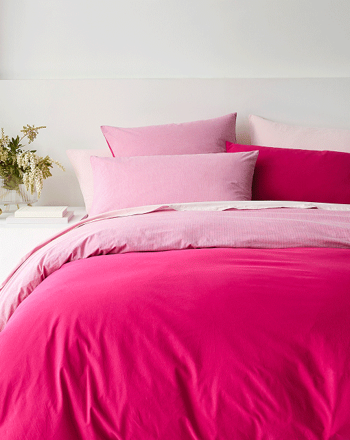 Arlo Cotton Stonewash reversible quilt cover set in raspberry