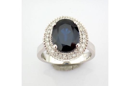 An Exquisite 18K White Gold Cluster Ring