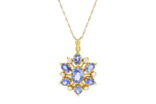 18ct gold seven stone oval cut sapphire pendant