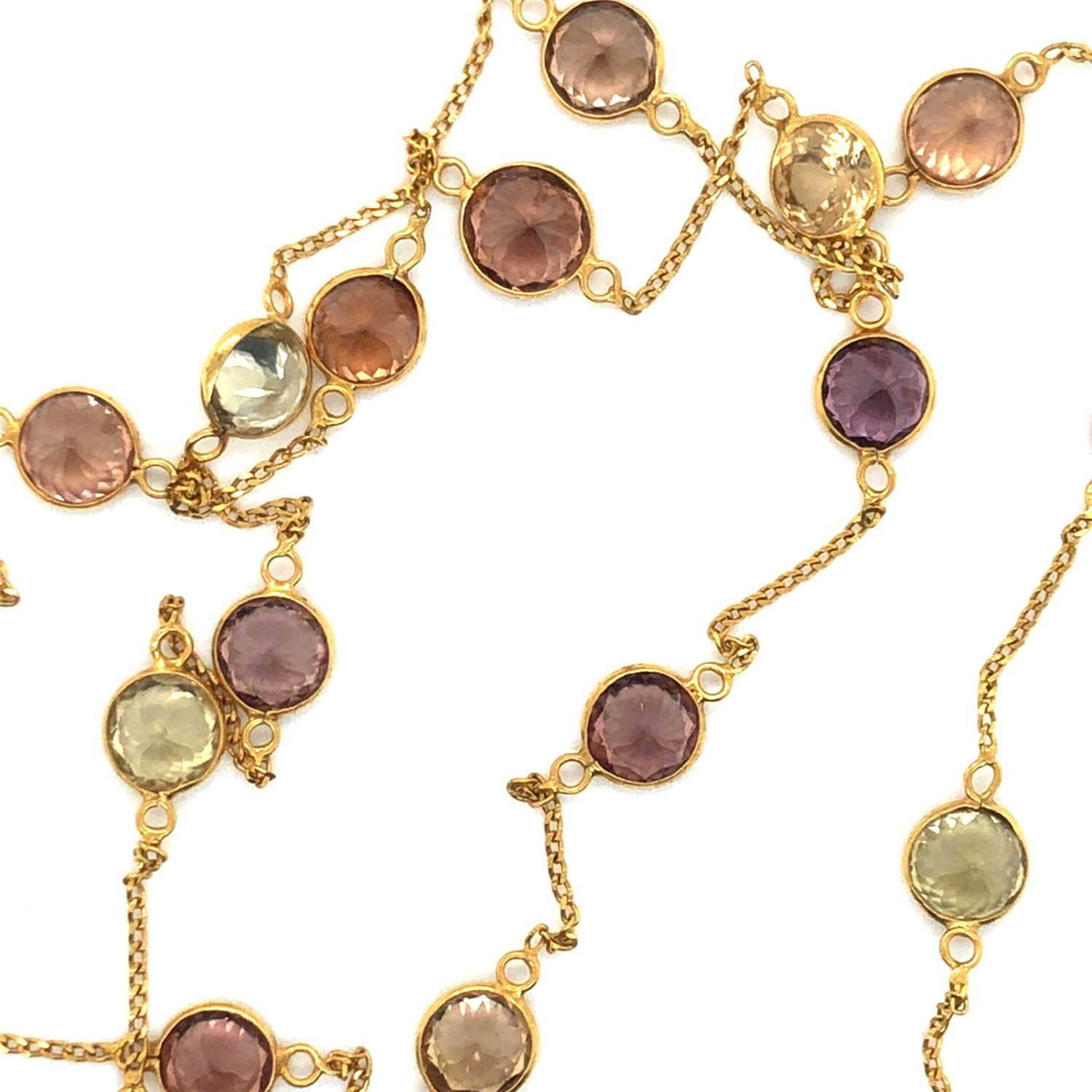 A multi-gemset station necklace