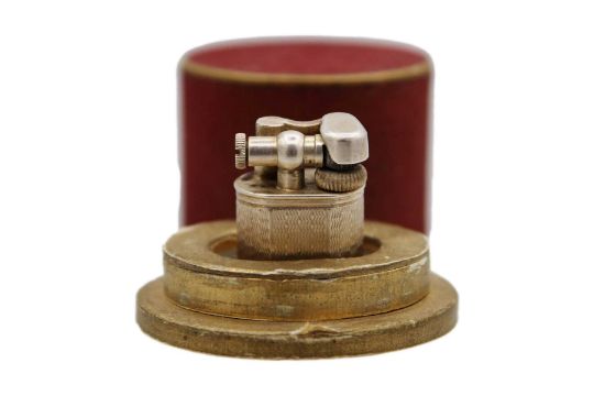 Dunhill - A 'baby Sylph' Silver-plated Engine Turned…