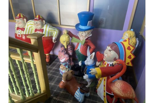 A Collection Of 9 Alice In Wonderland Large Figures