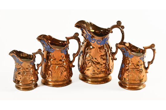 A graduated set of four 19thC copper jugs