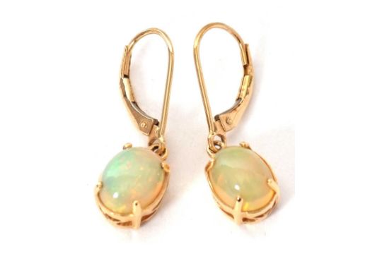 A pair of 18K opal earrings
