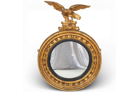A 19th century circular wall mirror