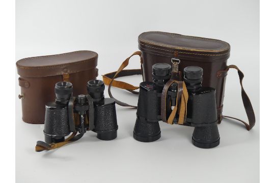 Two pairs of cased Binoculars