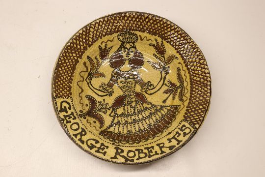 Late 19th century slipware charger, Toft Style
