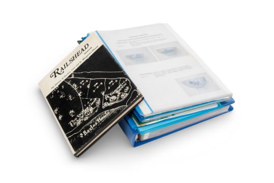 A number of folders containing articles