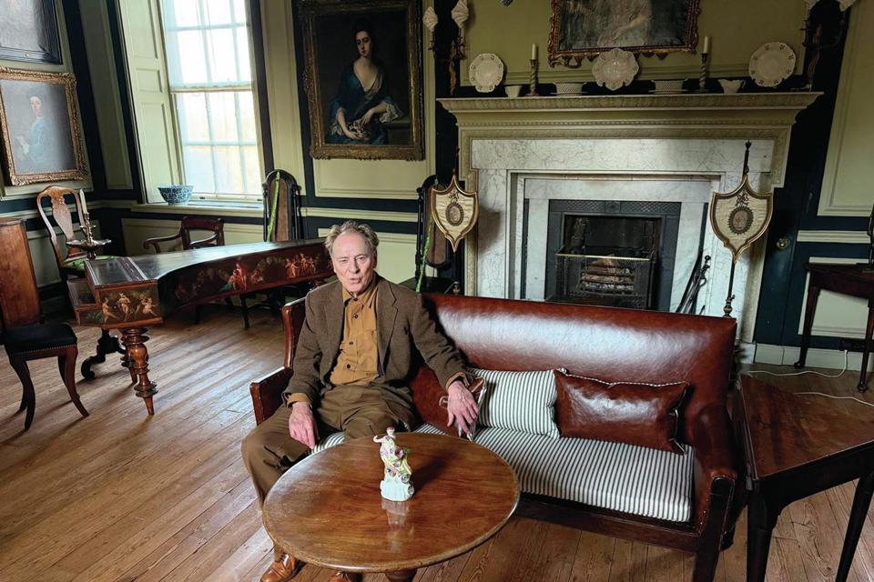Robert Tucker in his home in Rochester