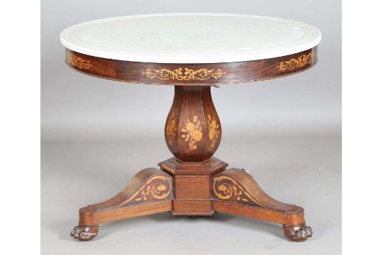 A late 19th century French Empire style rosewood table