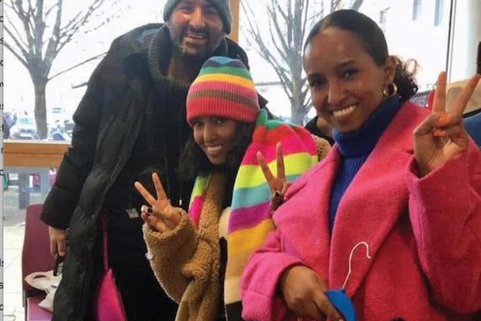 Buyers at a car boot sale
