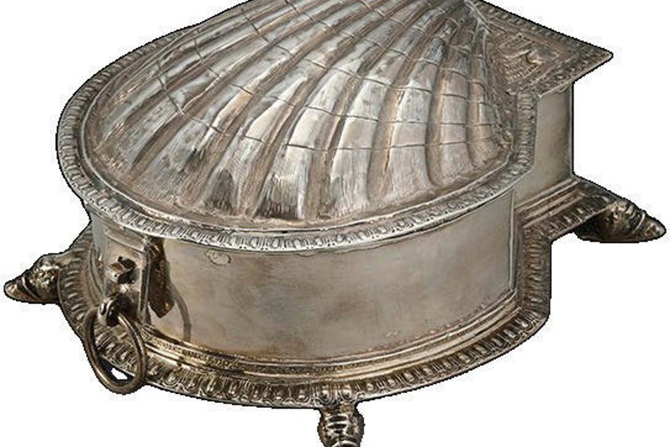 A silver sugar or spice box