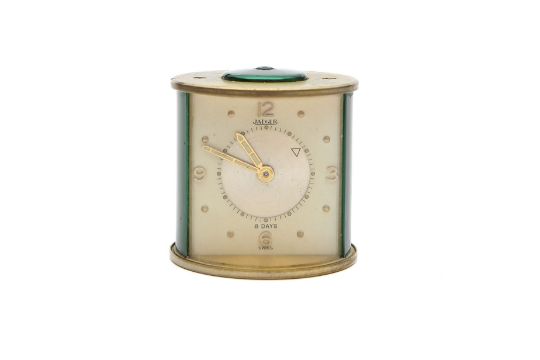 A Jaeger gilt metal miniature clock