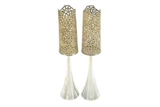 Stuart Devlin, a pair of parcel-gilt silver candlesticks